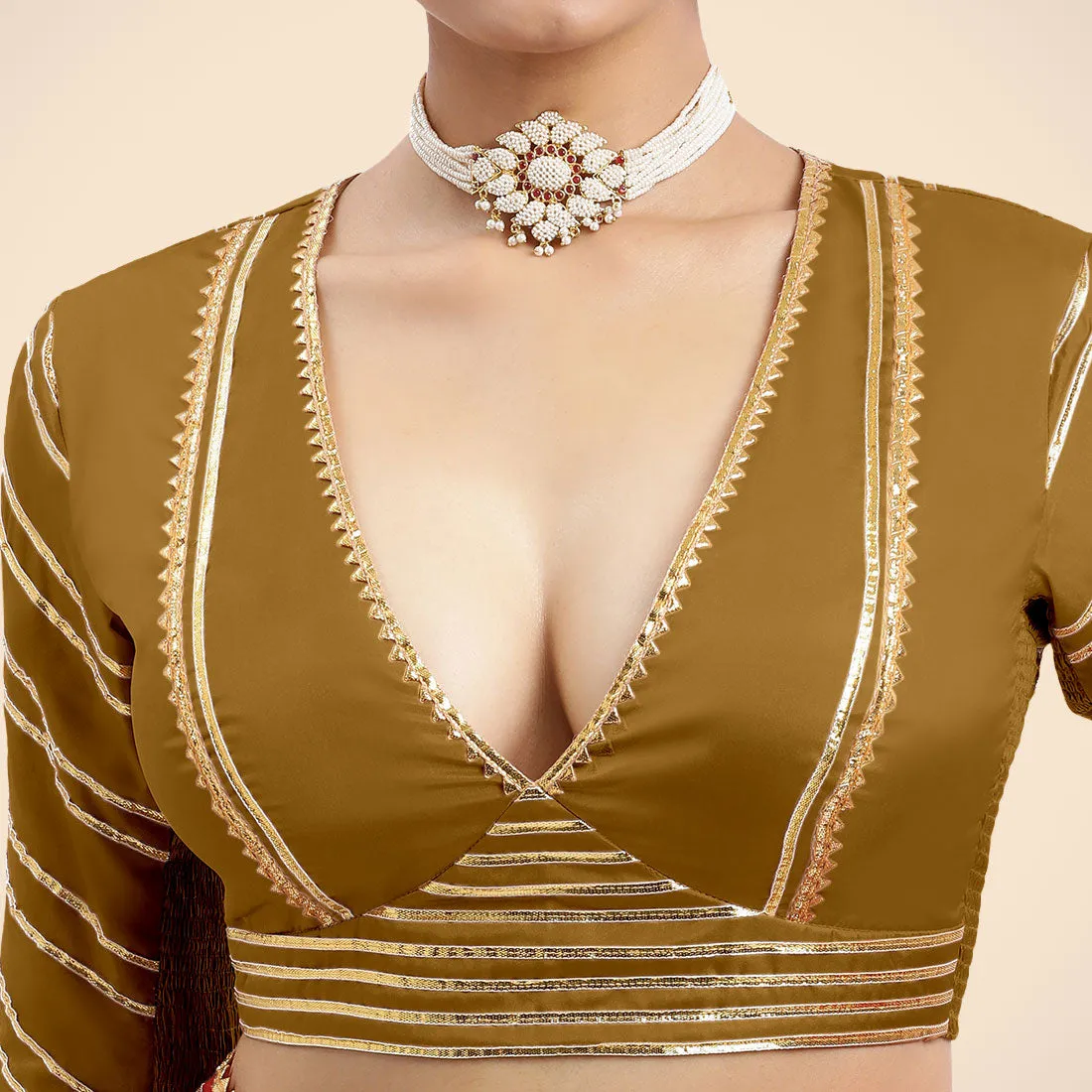 Navya x Tyohaar | Bronze Gold Elbow Sleeves FlexiFit™ Saree Blouse with Plunging V Neckline with Tasteful Golden Gota Lace