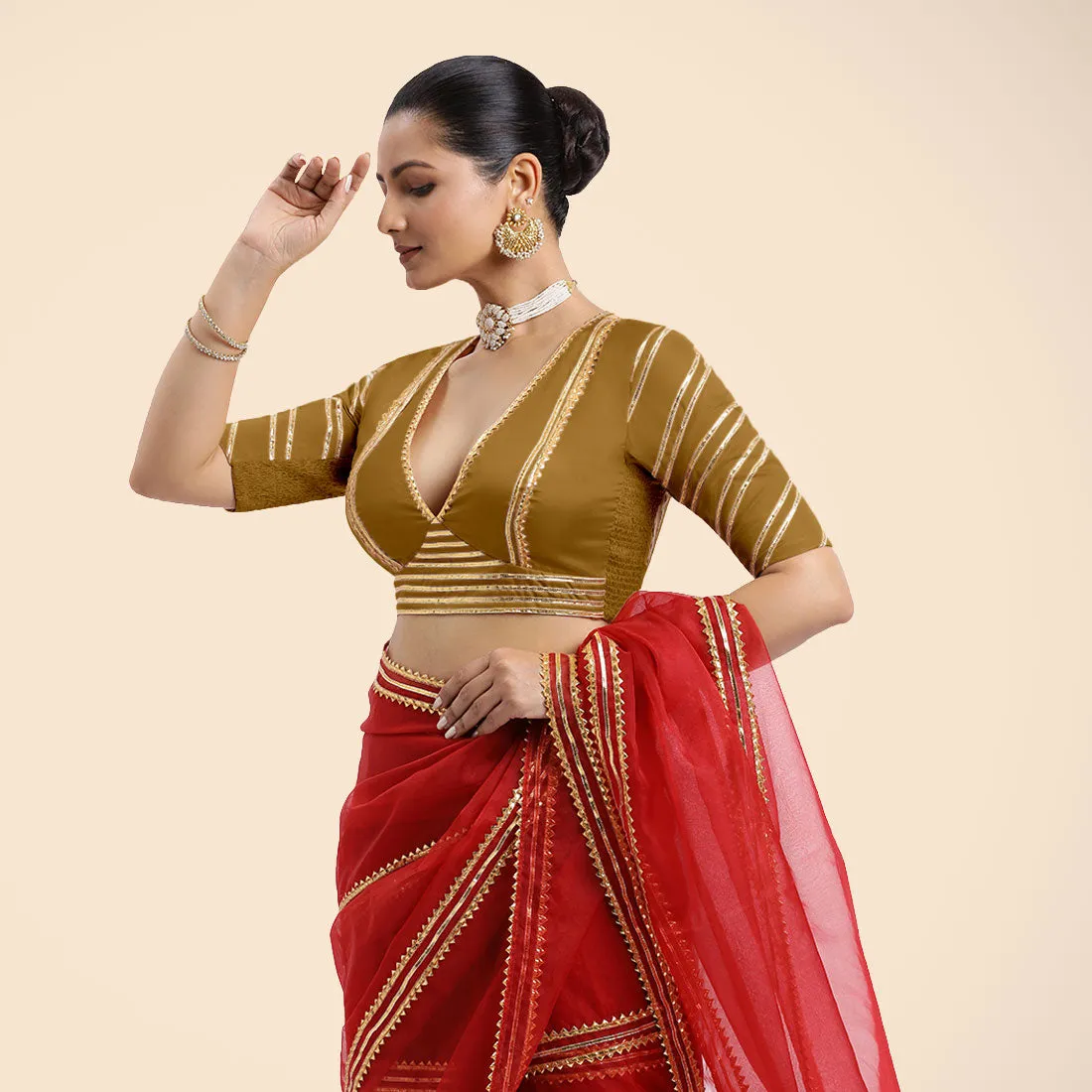 Navya x Tyohaar | Bronze Gold Elbow Sleeves FlexiFit™ Saree Blouse with Plunging V Neckline with Tasteful Golden Gota Lace