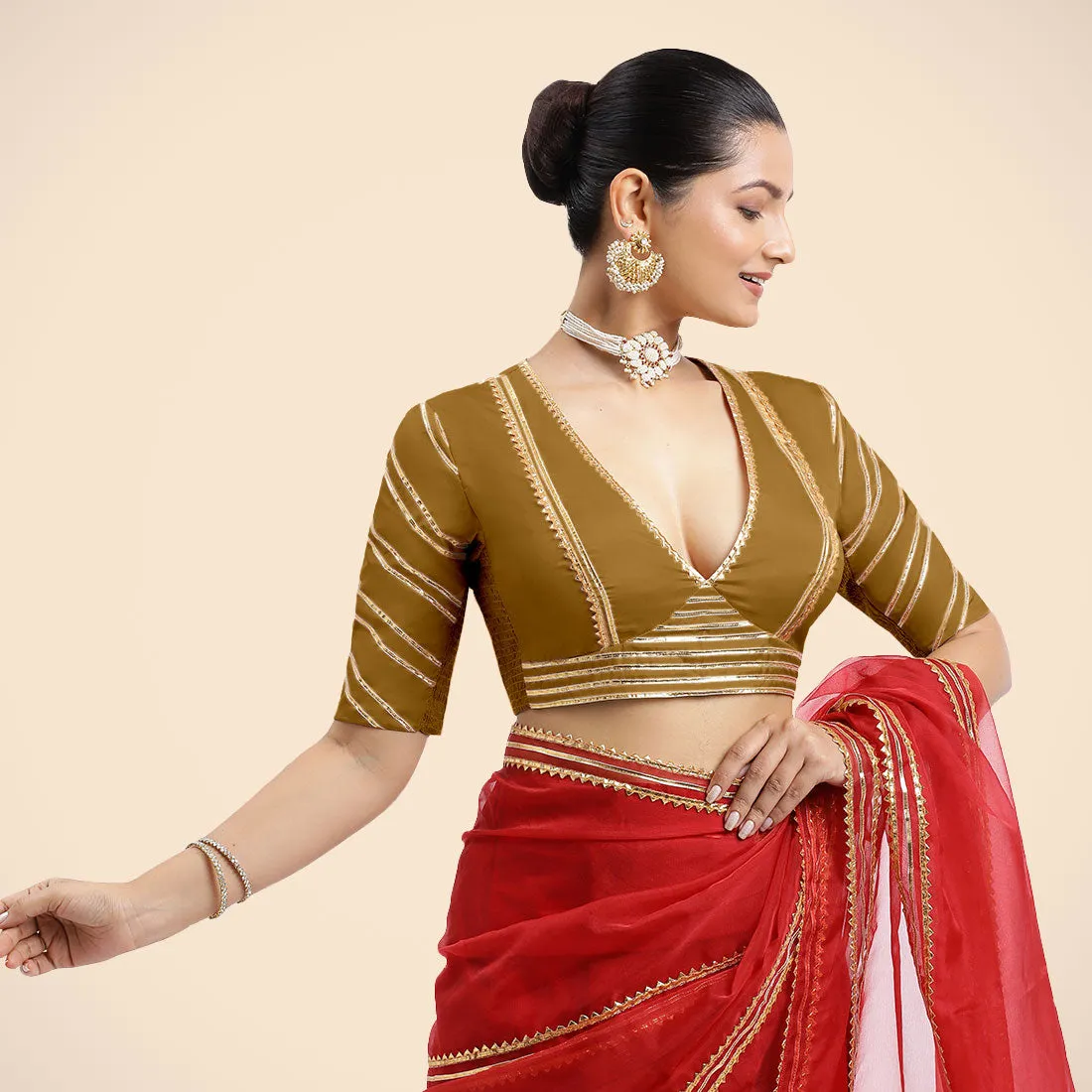 Navya x Tyohaar | Bronze Gold Elbow Sleeves FlexiFit™ Saree Blouse with Plunging V Neckline with Tasteful Golden Gota Lace